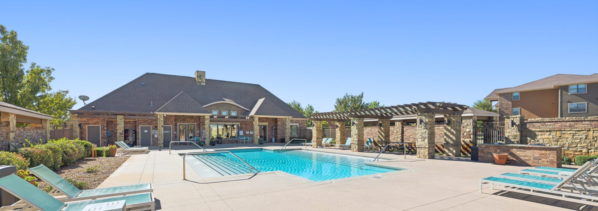 a patio area with a pool