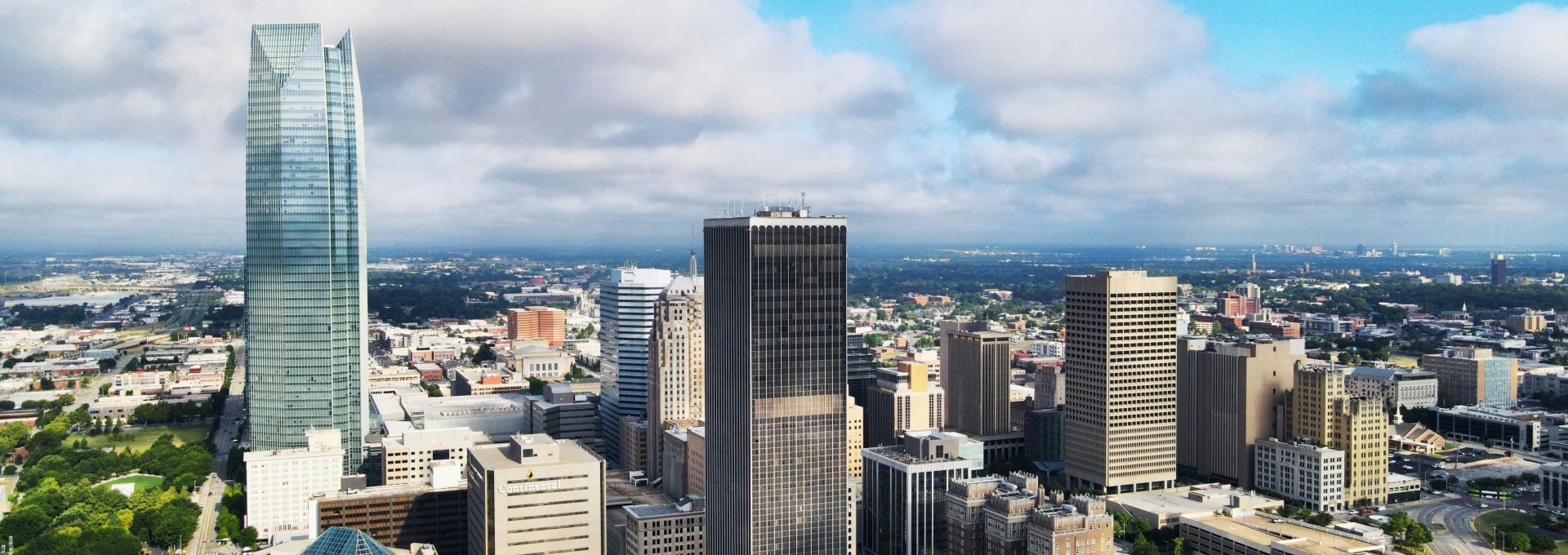 city buildings under blue sky during daytime