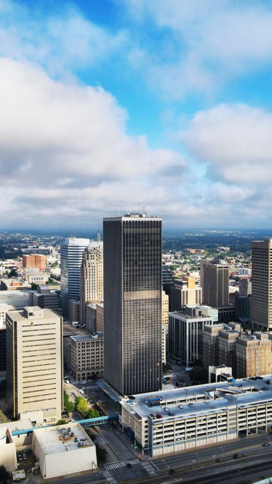 city buildings under blue sky during daytime